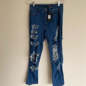 Fashion Nova NWT kneed some air jeans size 9